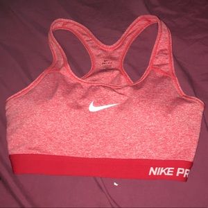 Red padded Nike sports bra